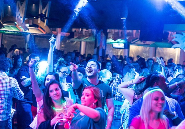 A picture of people having fun dancing at Jenk's Club.