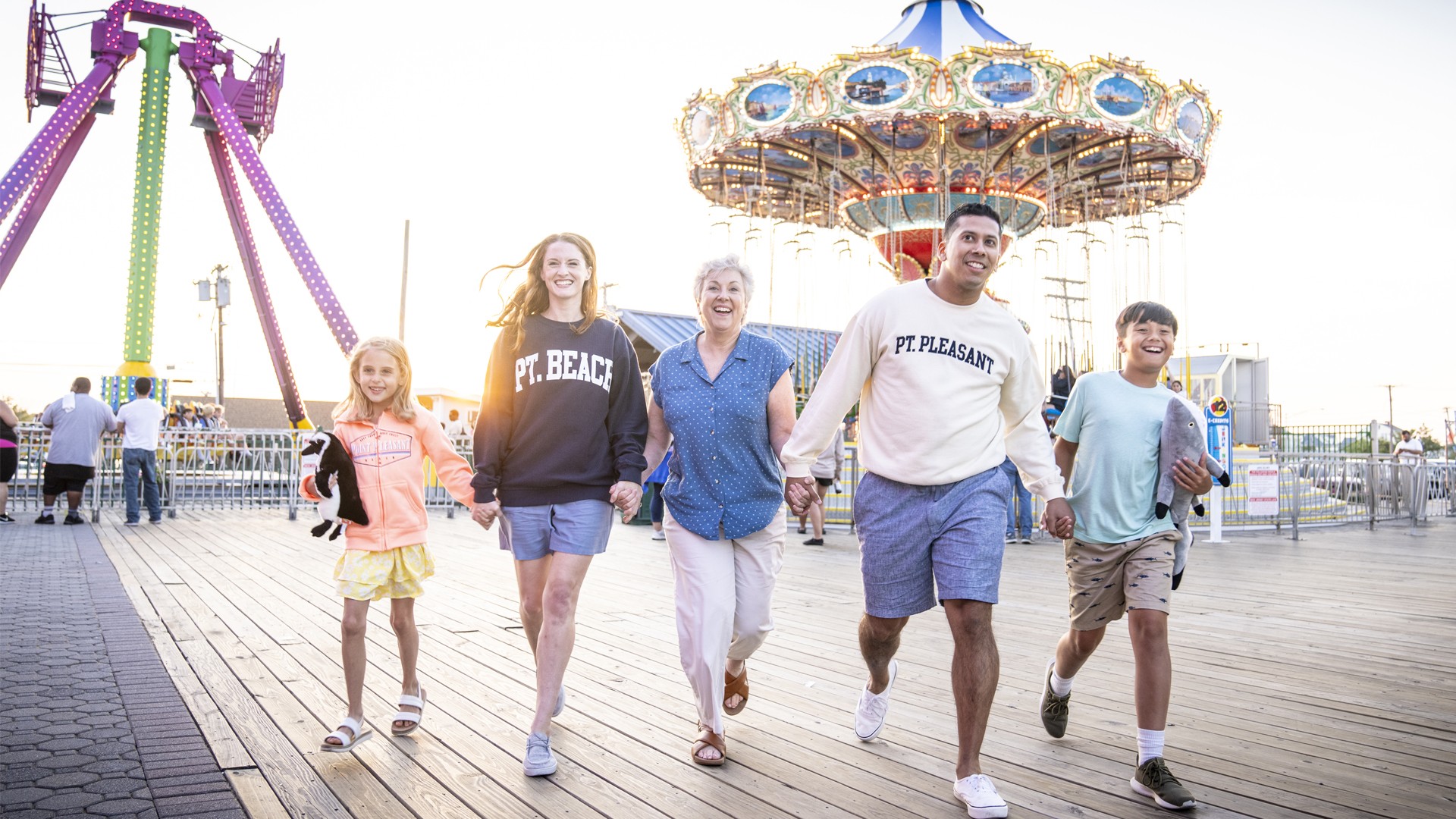 a family walking in the amusement park